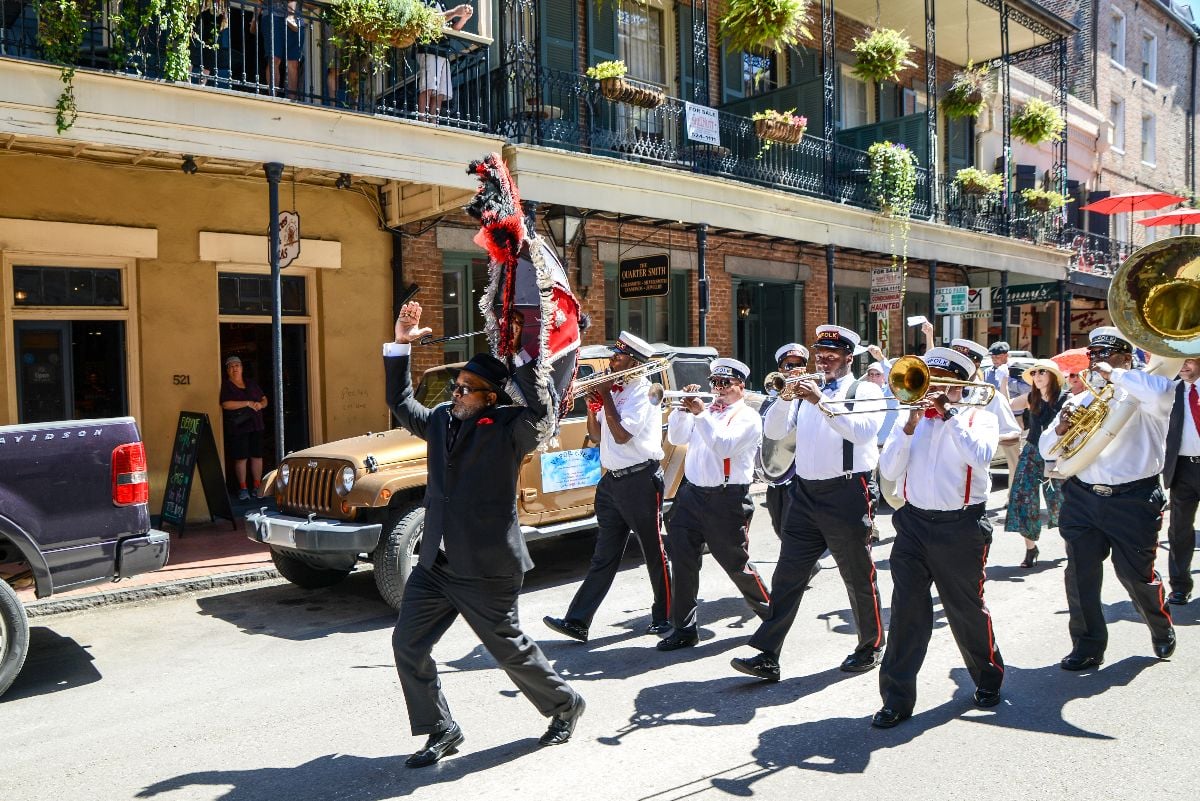 A Second Line band plays as it marches in the French Quarter.