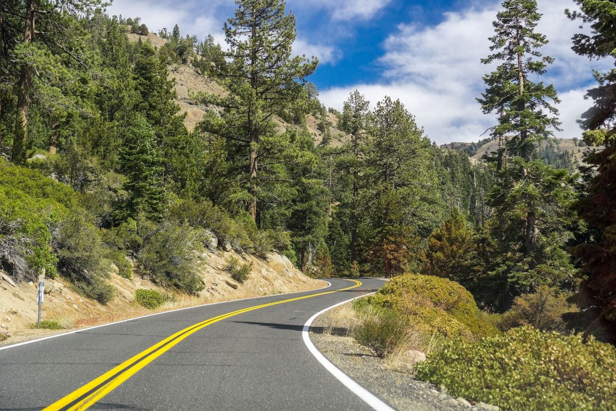 Driving through the Sierra mountains towards Sonora pass, California.