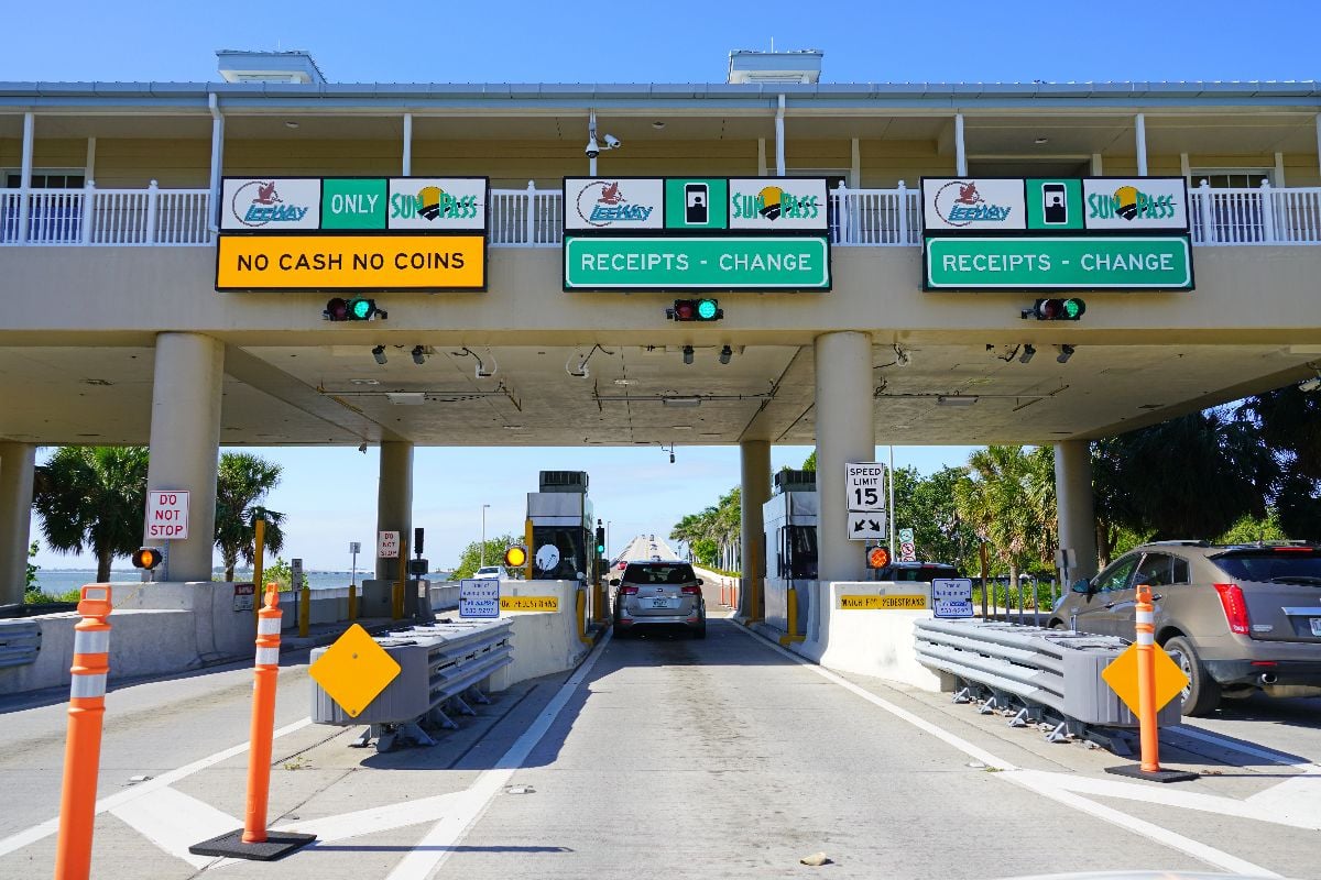 View of a tollbooth on the road at the entrance of Sanibel Island in Lee County.