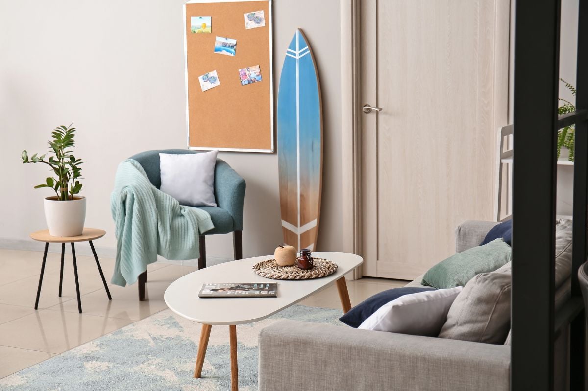 Interior of an apartment with surfboard.