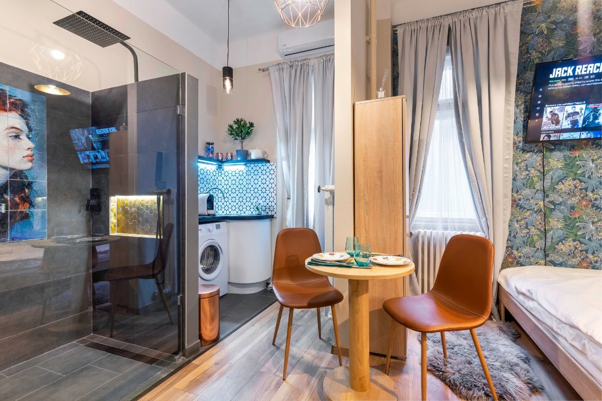 Luxurious tiny home space with a shower in the room.