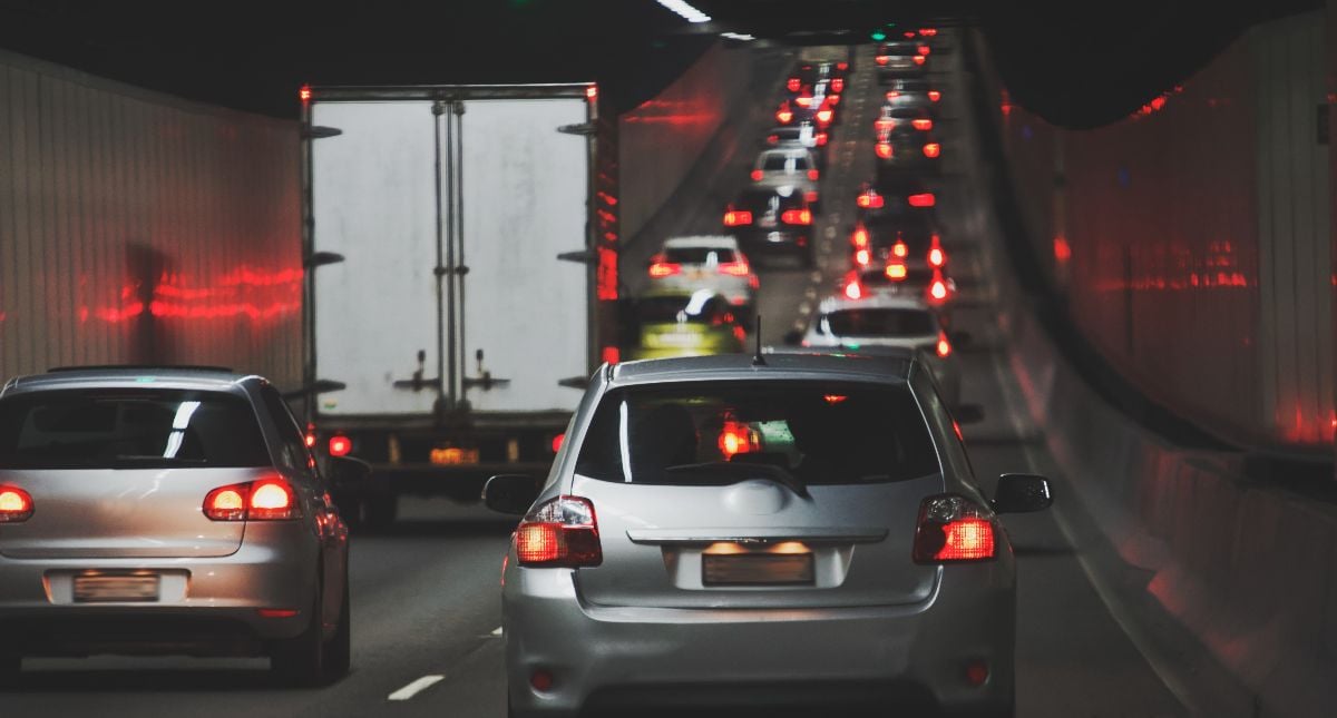 Traffic jam in urban tunnel vehicles in row.