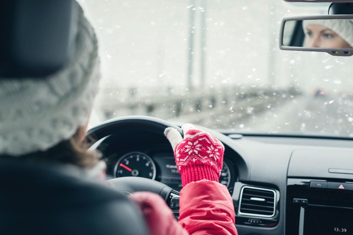 Woman driving during winter.