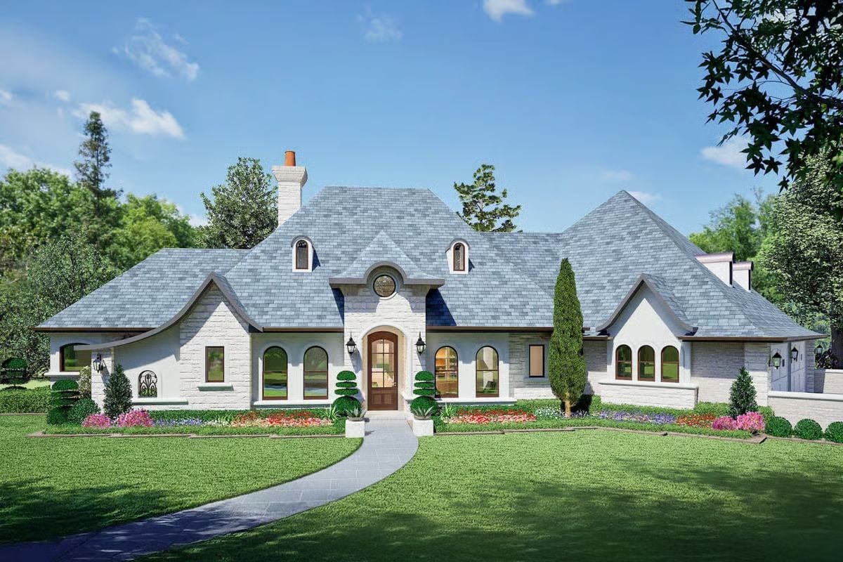 4-Bedroom French Country Home for a Wide Lot with Angled 3-Car Garage (Floor Plan)