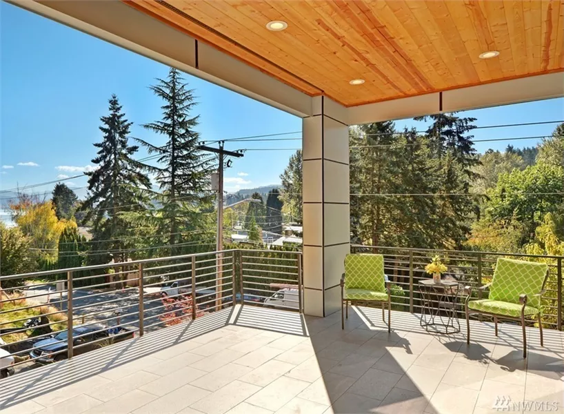 Covered Deck with Wood Plank Ceiling and Horizontal Cable Railings