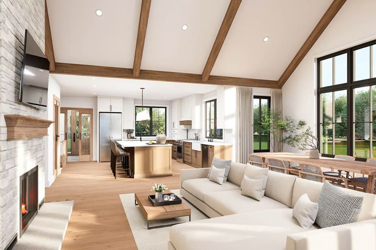 Vaulted Ceilings with Exposed Beams Give Volume to an Open-Concept Floor
