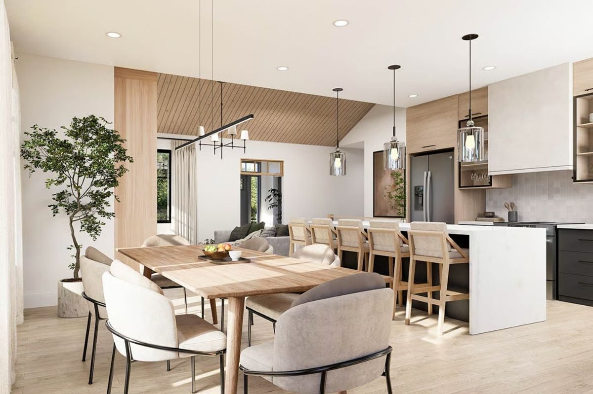 Pendant Lights Over the Island Define the Kitchen Without Walling It Off