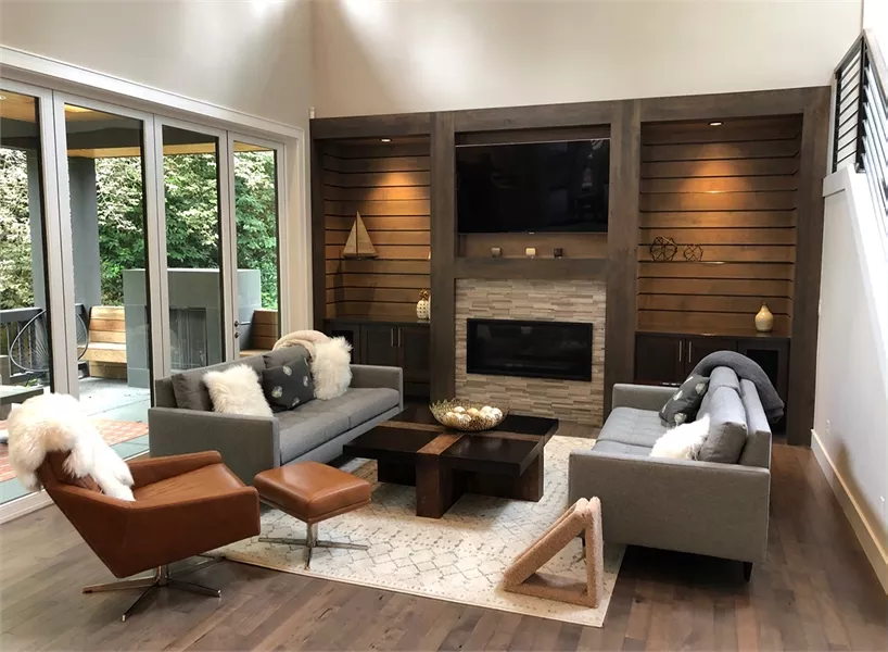 Wood-Paneled Living Room with Built-In Entertainment Wall and Fireplace