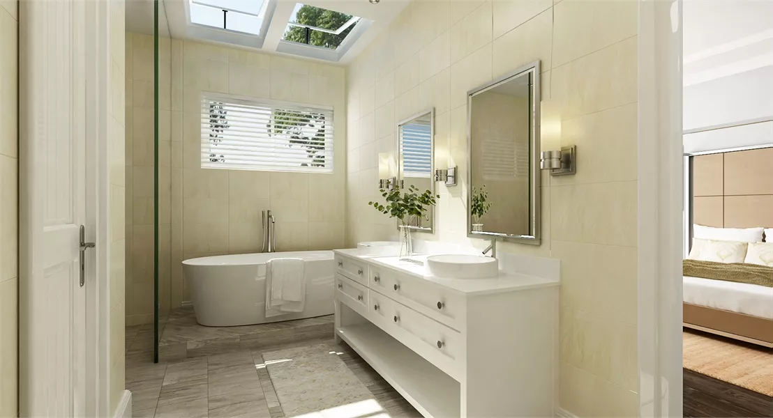 Skylit Ensuite Bathroom with Freestanding Tub and Glass Partition