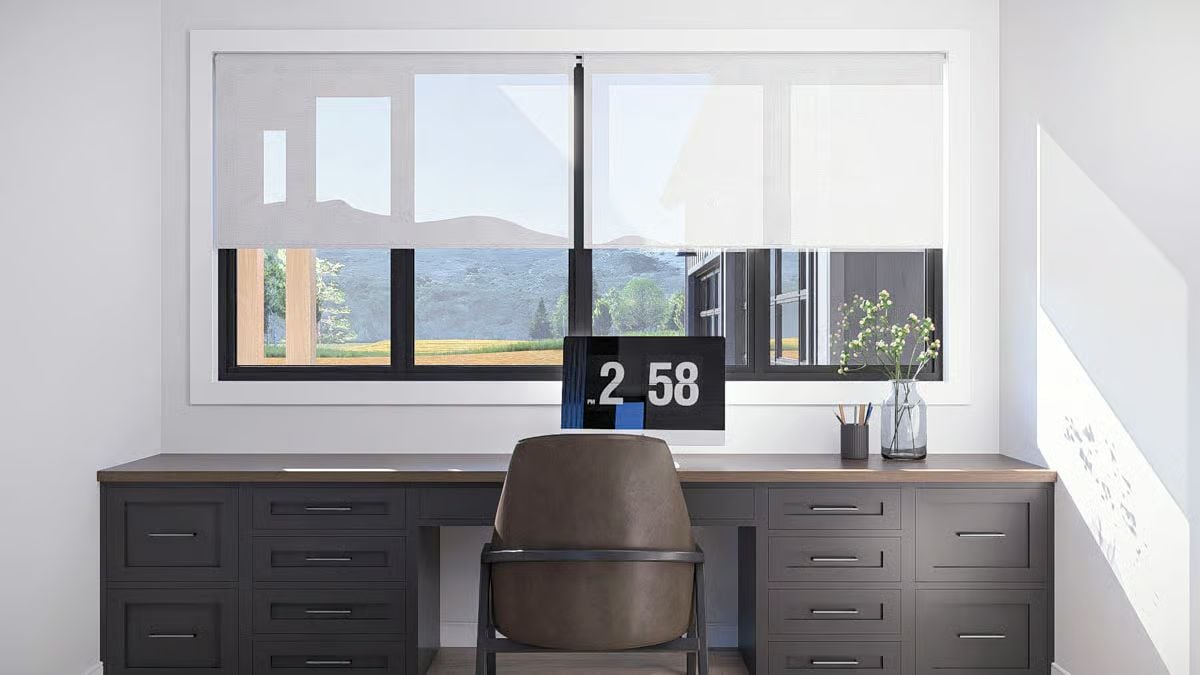 Home Office with Built-In Desk Cabinetry and Flip Clock Display