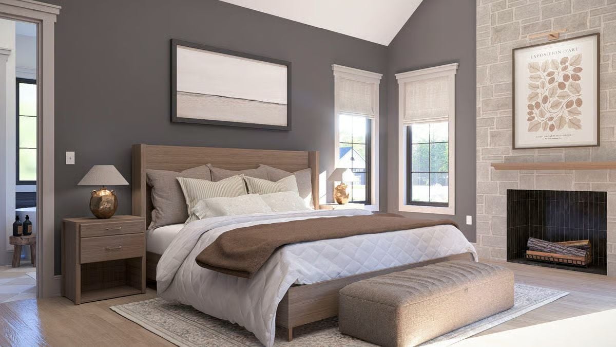 Gray Walls and White Trim Frame a Fireplace That Anchors the Whole Bedroom
