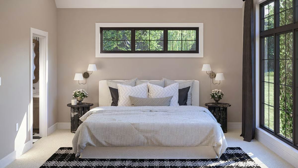 Upholstered Headboard and Framed Window Above Create Symmetry Without Trying