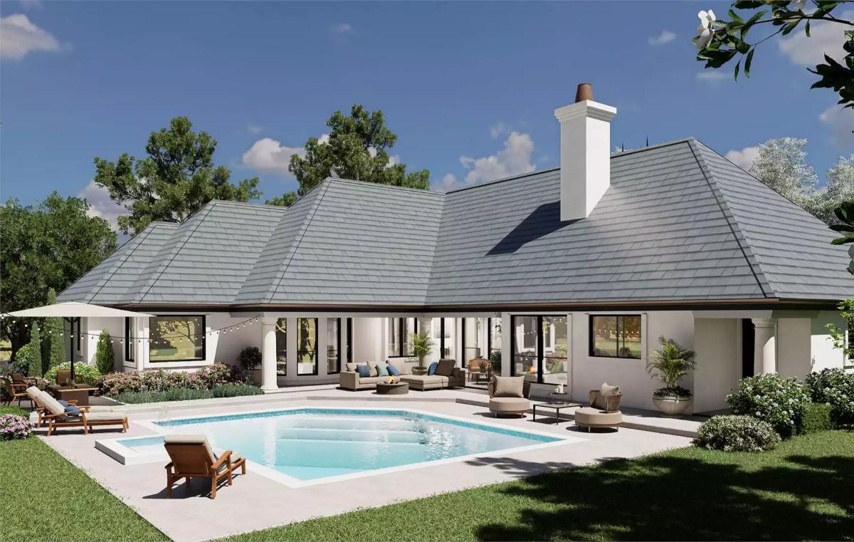 Gray Shingle Roof and White Stucco Frame a Pool Terrace Built for Stillness