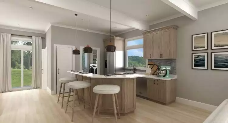 Pendant Lights Drop Low Over an Island Built for Sitting and Staying