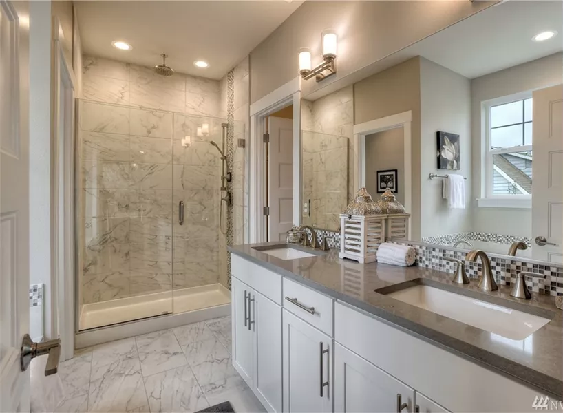 Master Bathroom with Marble Shower and Double Vanity