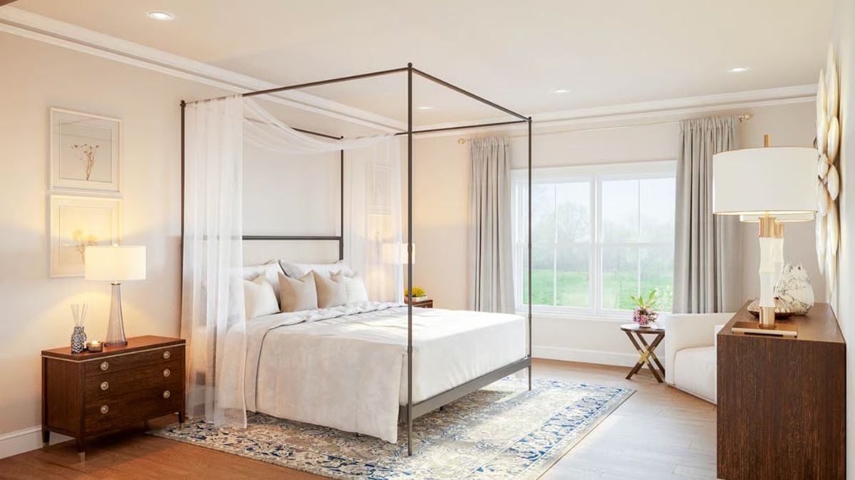 Canopy Bed with Sheer Drapes and Soft Neutral Tones