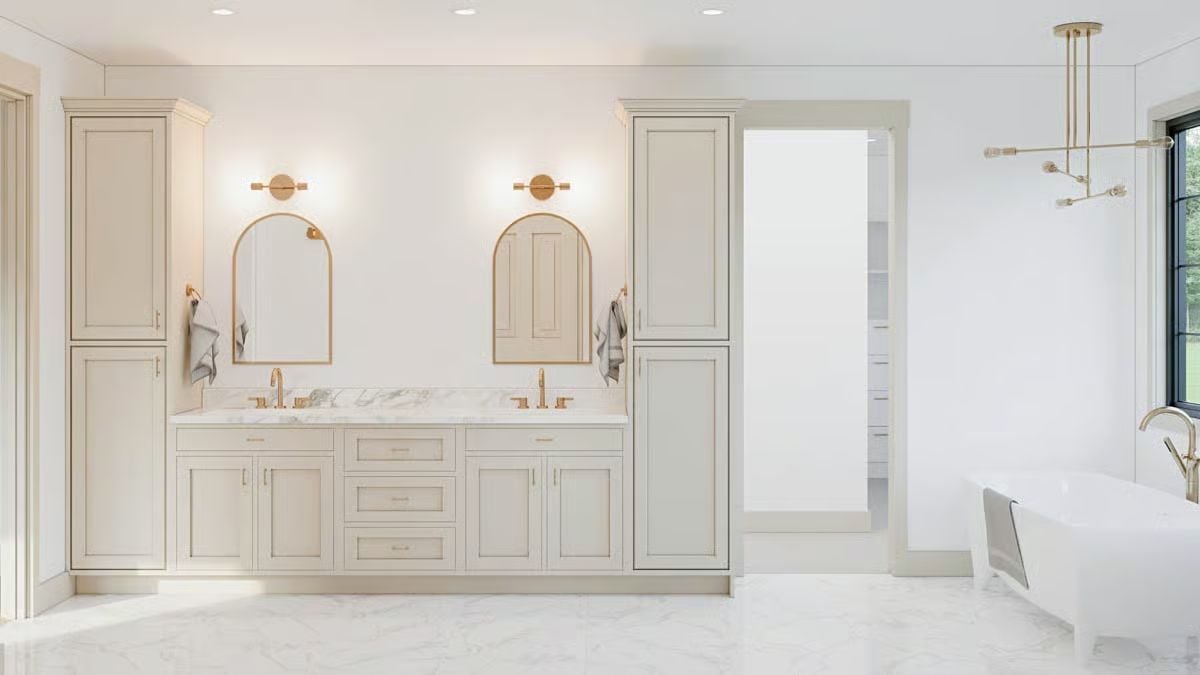 Primary Bathroom with Dual Arched Mirrors and Marble Flooring