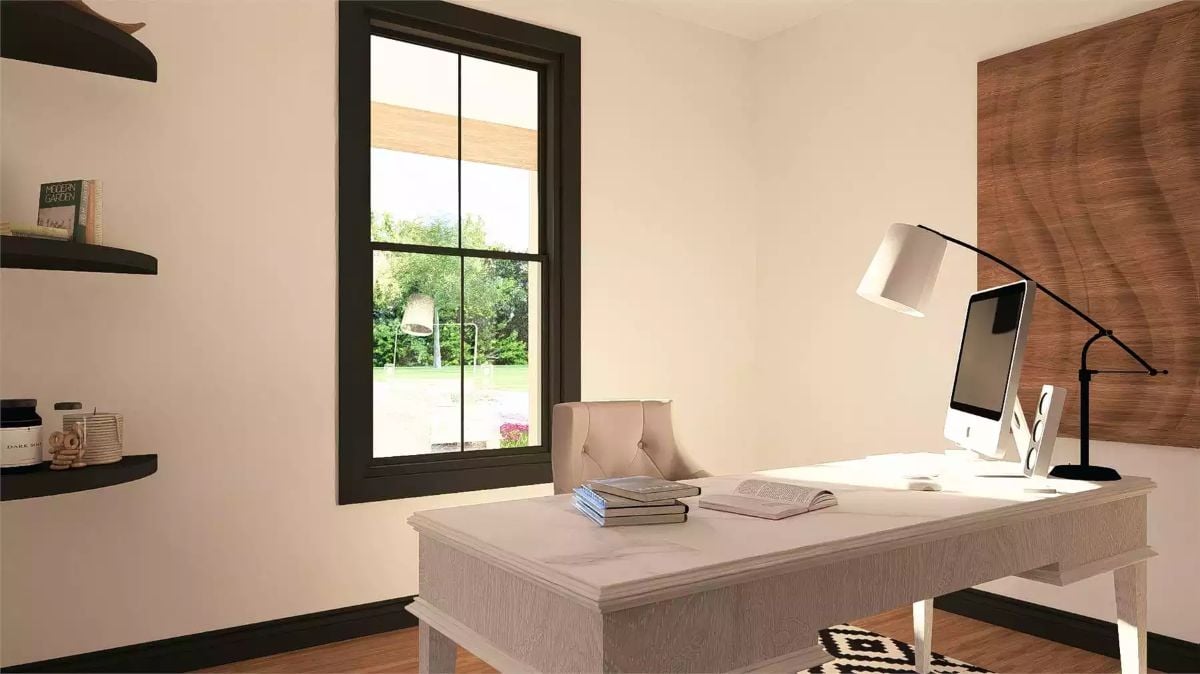 Bright Home Office with White Desk and Black Adjustable Task Lamp