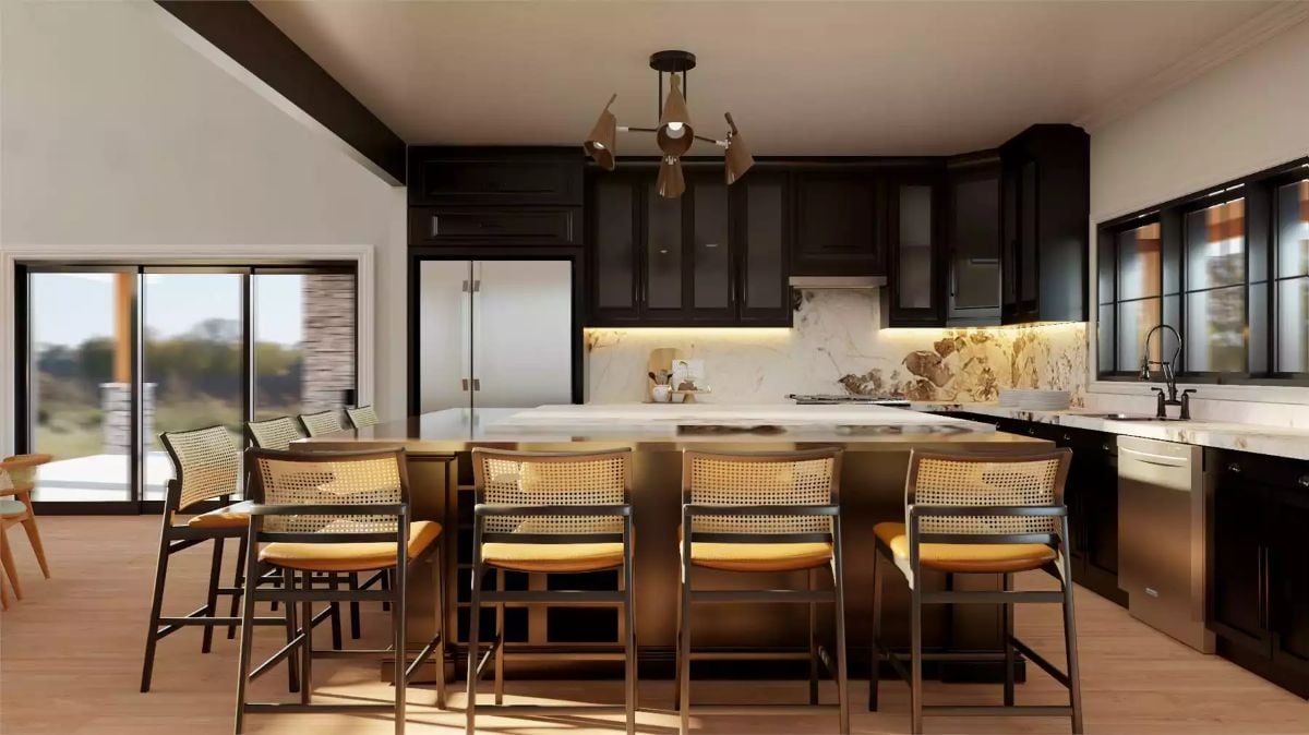 Kitchen and Dining Area with Dark Cabinetry and Cane-Back Seating