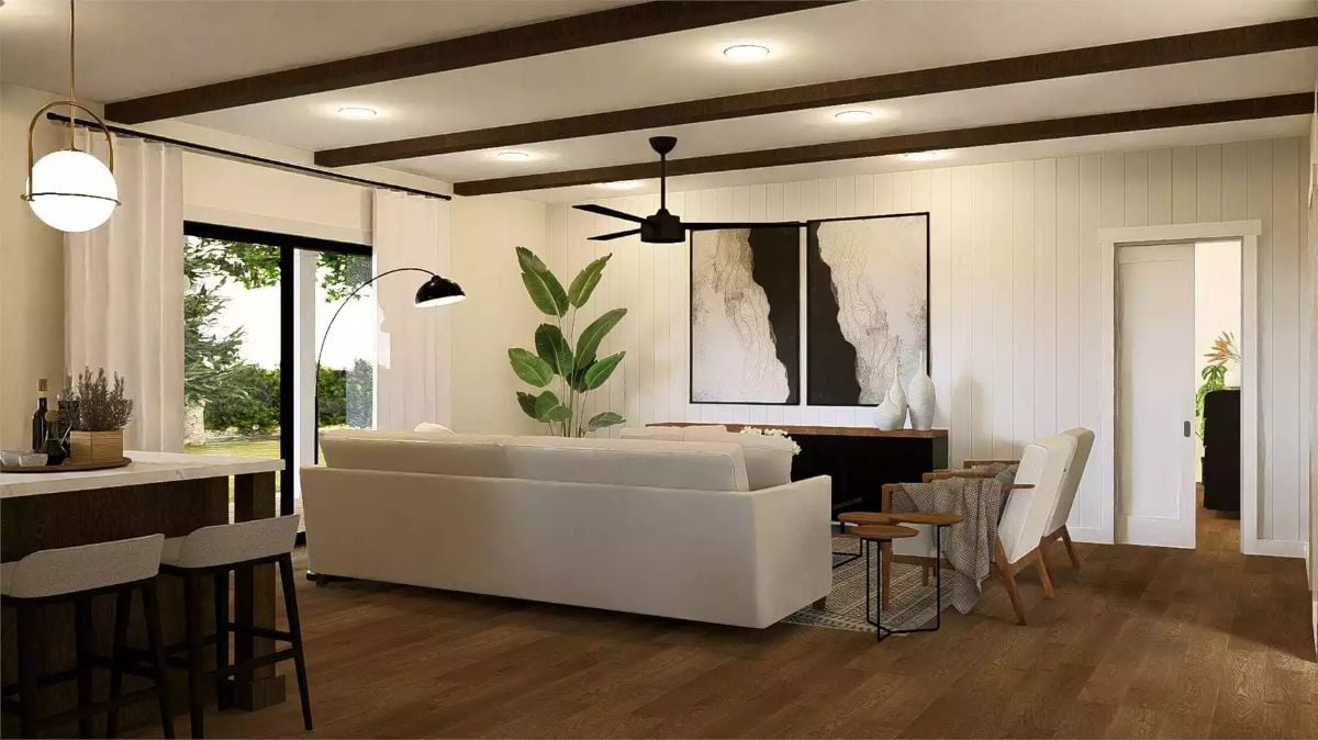 Open Living Space with Dark Beams and Vertical Shiplap Walls