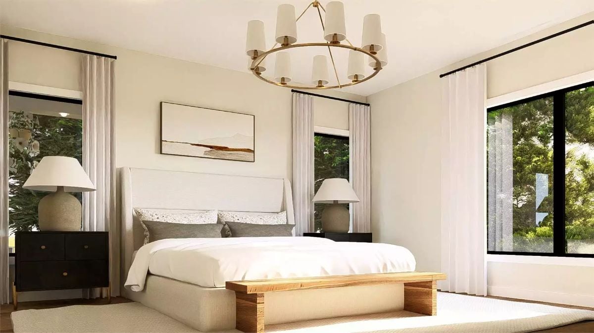 Primary Bedroom with Circular Chandelier and Wraparound Windows