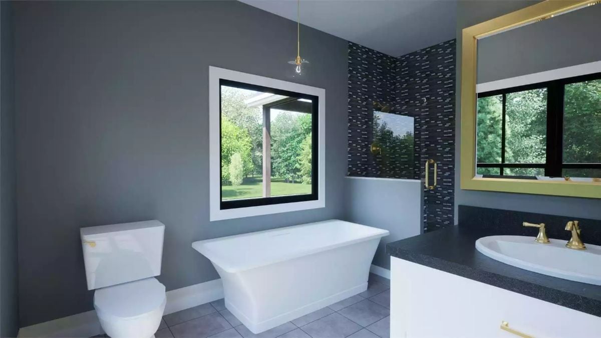Modern Bathroom with Freestanding Tub and Black Tile Accent Wall
