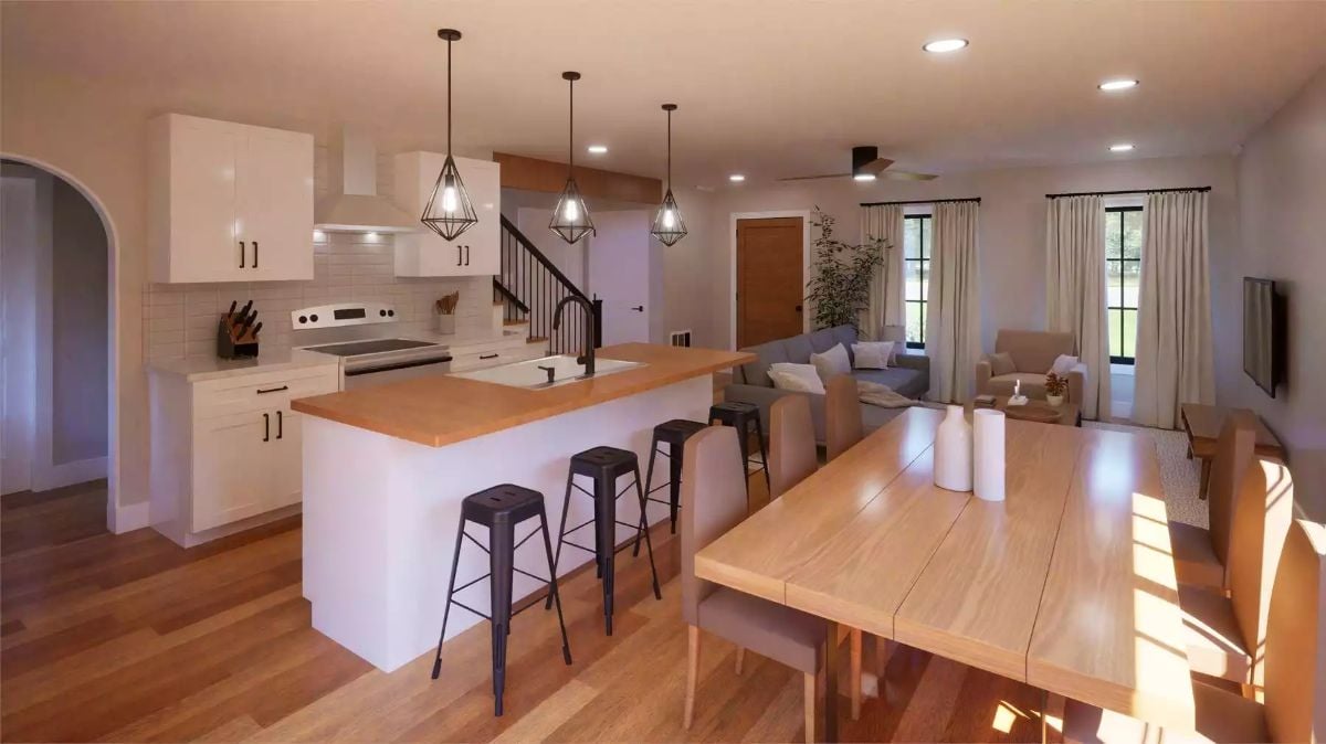 Open Kitchen with Wood-Topped Island and Black Metal Pendant Lights