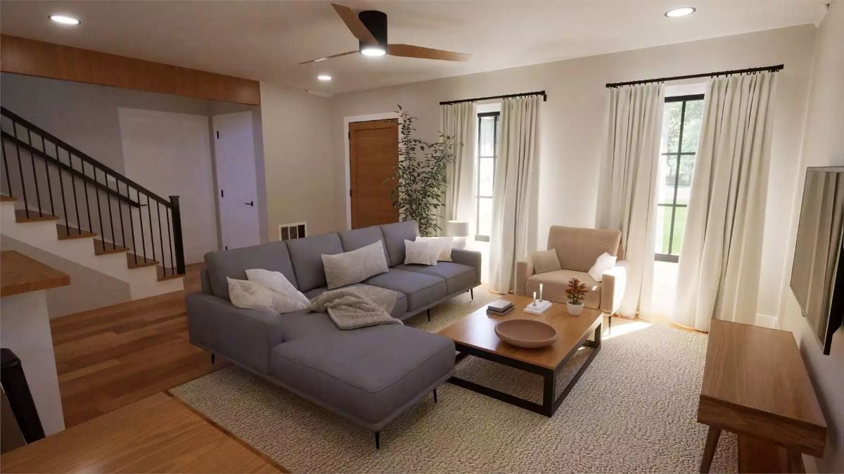 Open-Concept Living Room with Gray Sectional and Natural Light