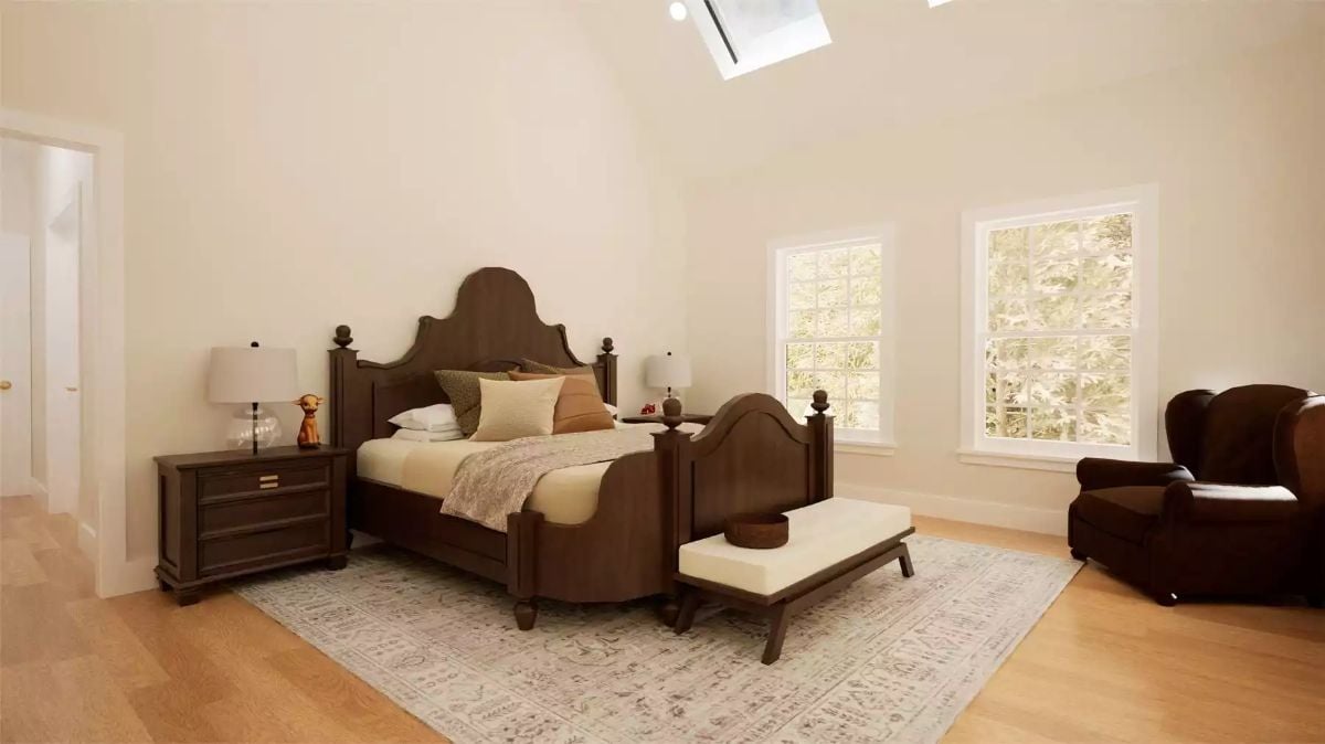 Primary Bedroom with Dark Wood Four-Poster Bed and Vaulted Ceiling