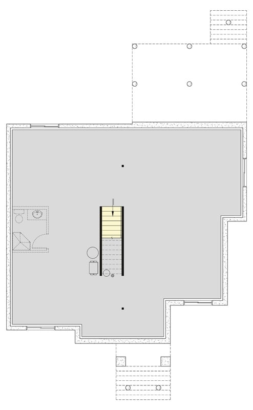 Basement Floor Plan: A Staircase Anchors the Center So Every Room Radiates Outward