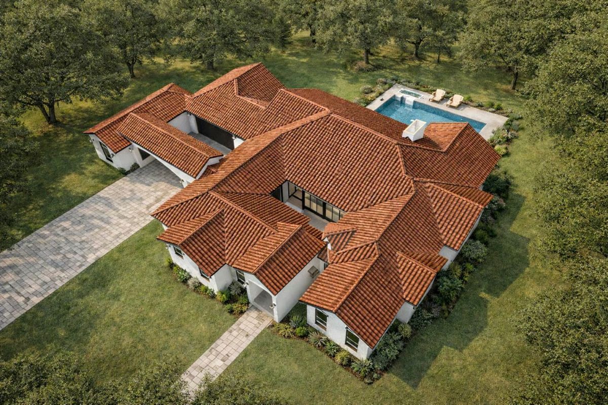 Aerial View of Terracotta Rooflines and Courtyard Pool Area