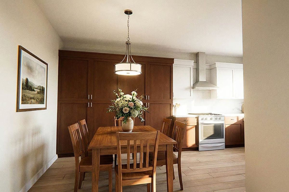 Dining Area with Wood Table and Pendant Lighting