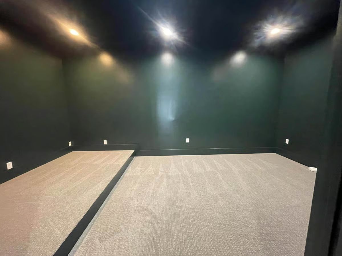 Home Theater with Dark Ceiling and Recessed Lighting