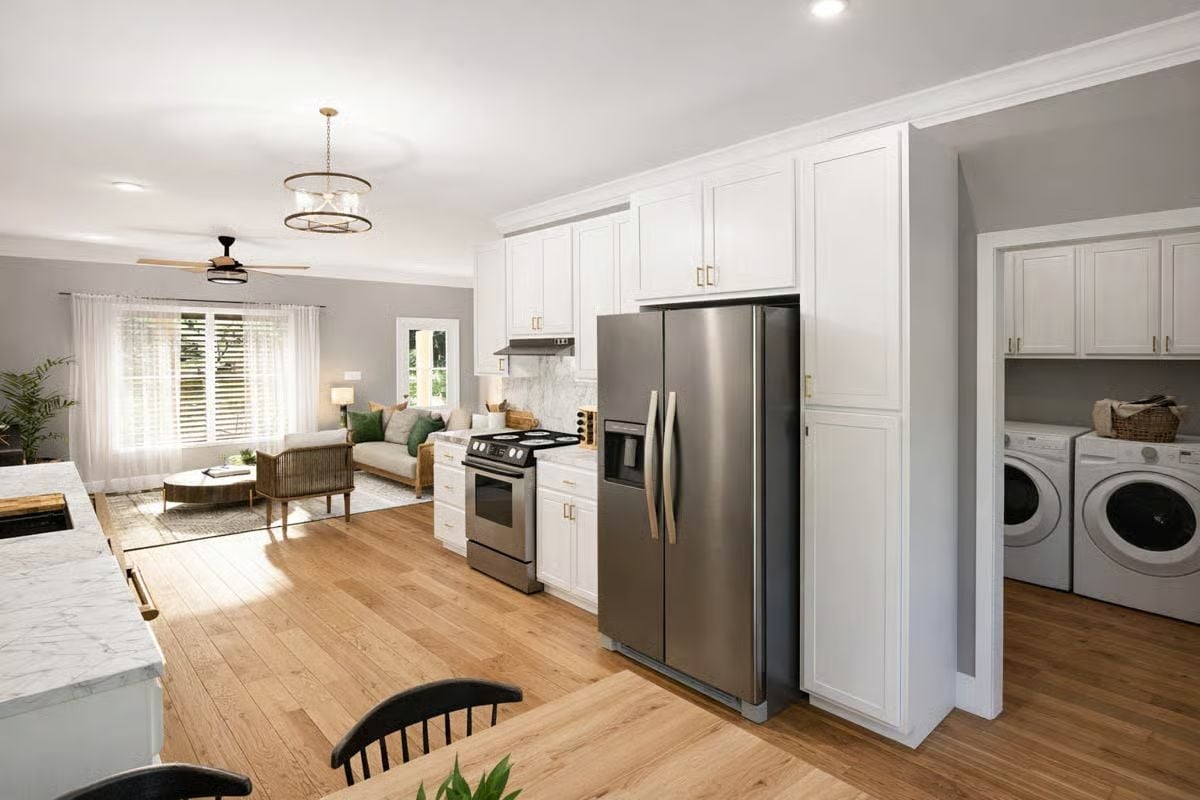 Open Kitchen with Integrated Laundry and Stainless Steel Appliances