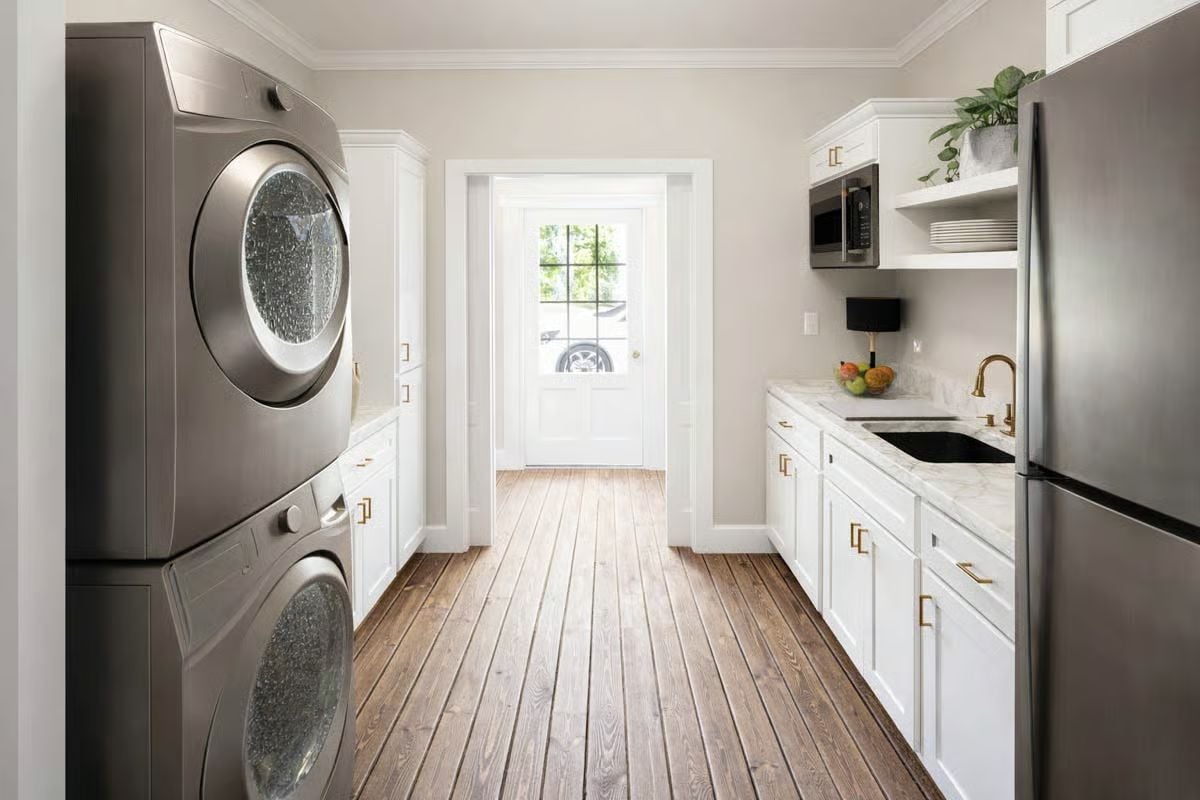 Stacked Washer-Dryer Meets Marble Countertops in One Hardworking Utility Room