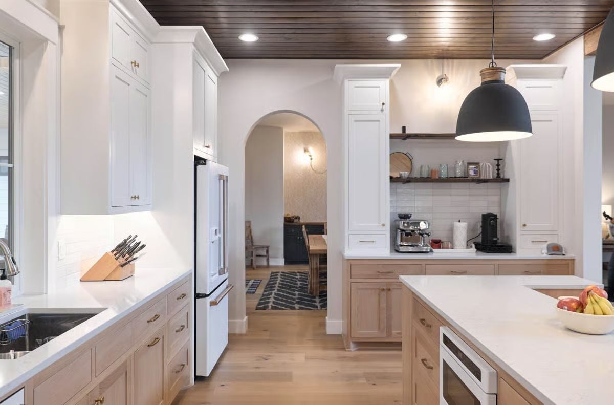 White and Natural Wood Kitchen with Coffee Bar and Dark Wood Ceiling