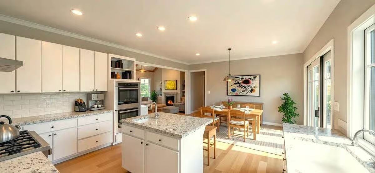 Kitchen Island and Dining Area Bathed in Natural Sunlight