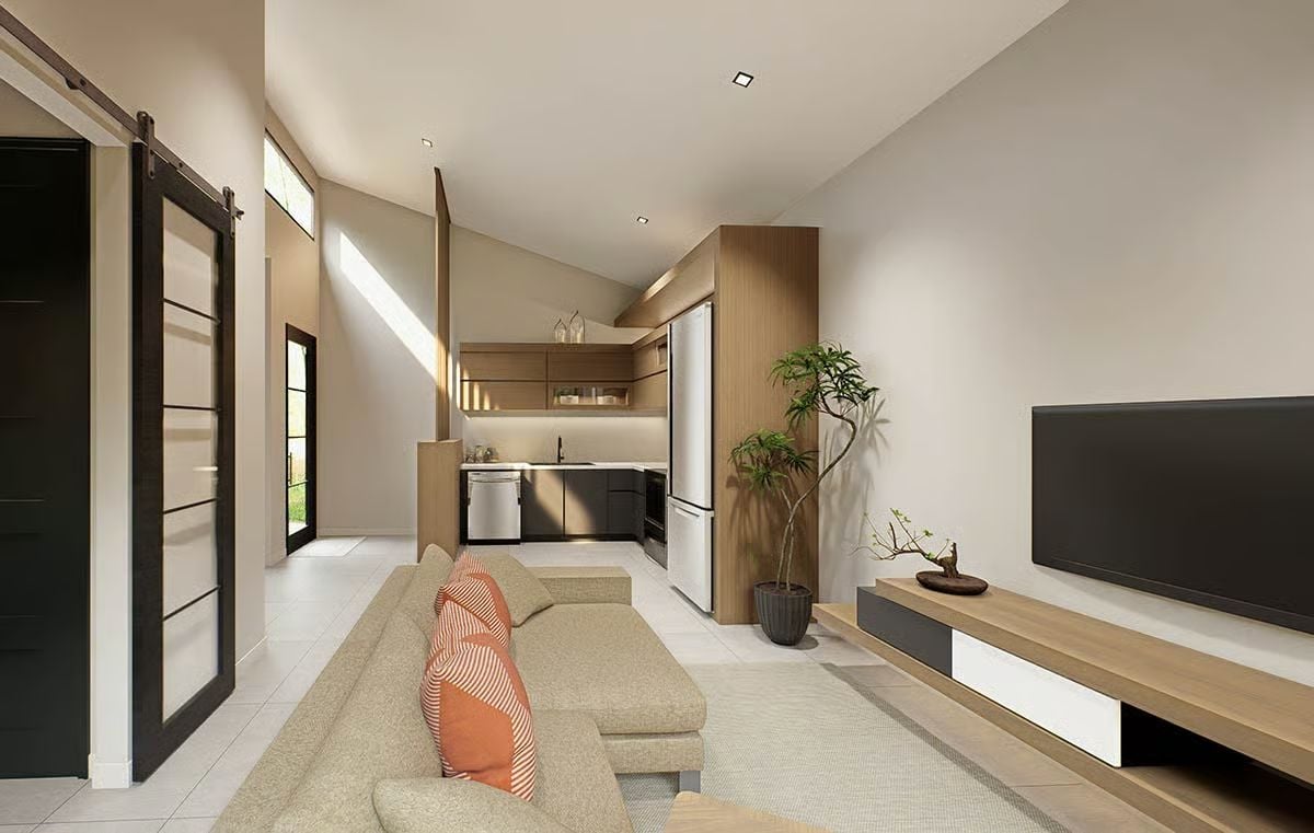 Open-Plan Living With Warm Wood Accents and a Compact Kitchen