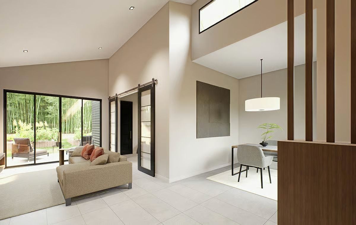 Clerestory Windows and a Barn Door Define This Open Living Area
