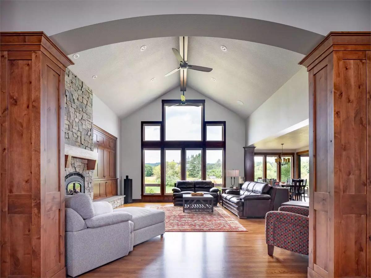 Cathedral Ceiling and Leather Sofas Define a Great Room Built for Gathering