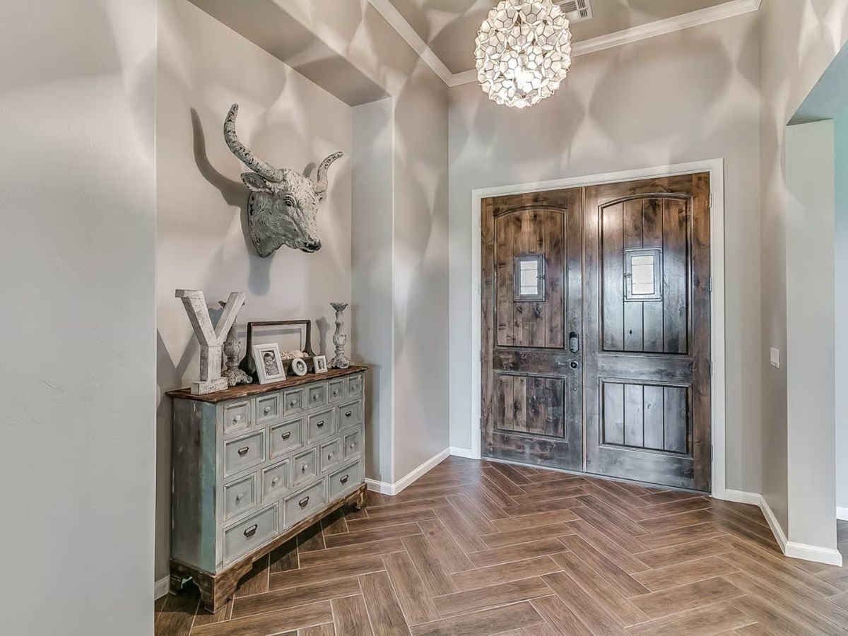 Foyer Entry with Rustic Double Doors and Coffered Ceiling Detail