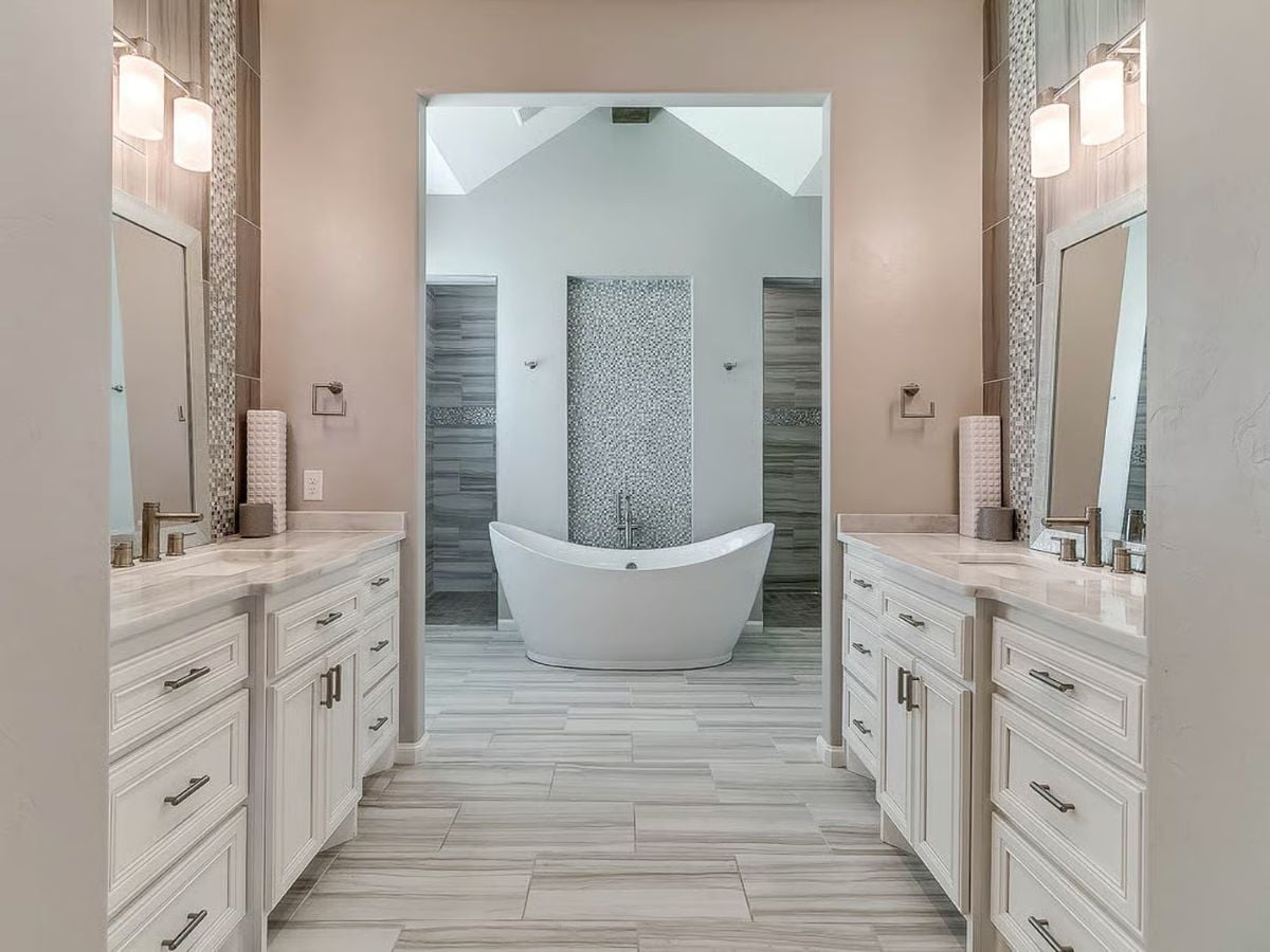 Primary Bathroom with Freestanding Tub and Dual Vanity Layout