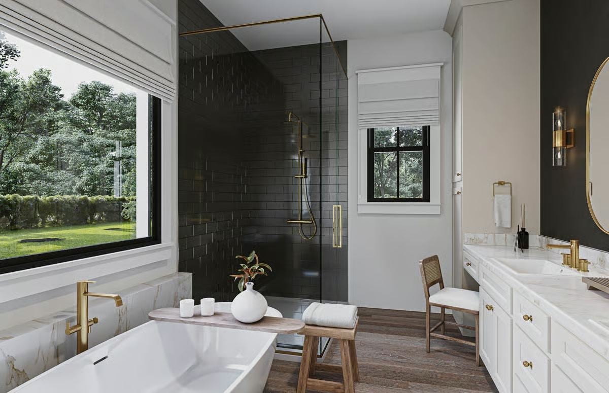 Spa-Inspired Primary Bath with Dark Subway Tile Shower and Gold Fixtures