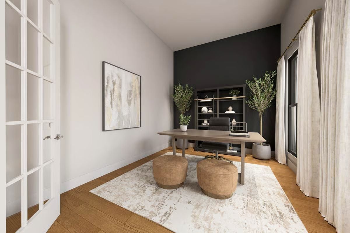 Dark Accent Wall Anchors a Home Office Built for Focus