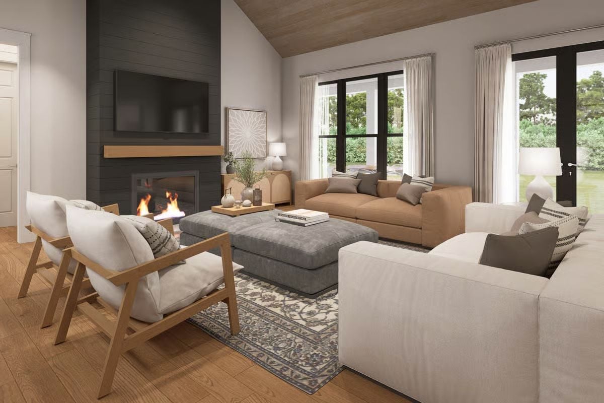 Warm Wood Tones and a Dark Shiplap Fireplace Wall Set the Mood