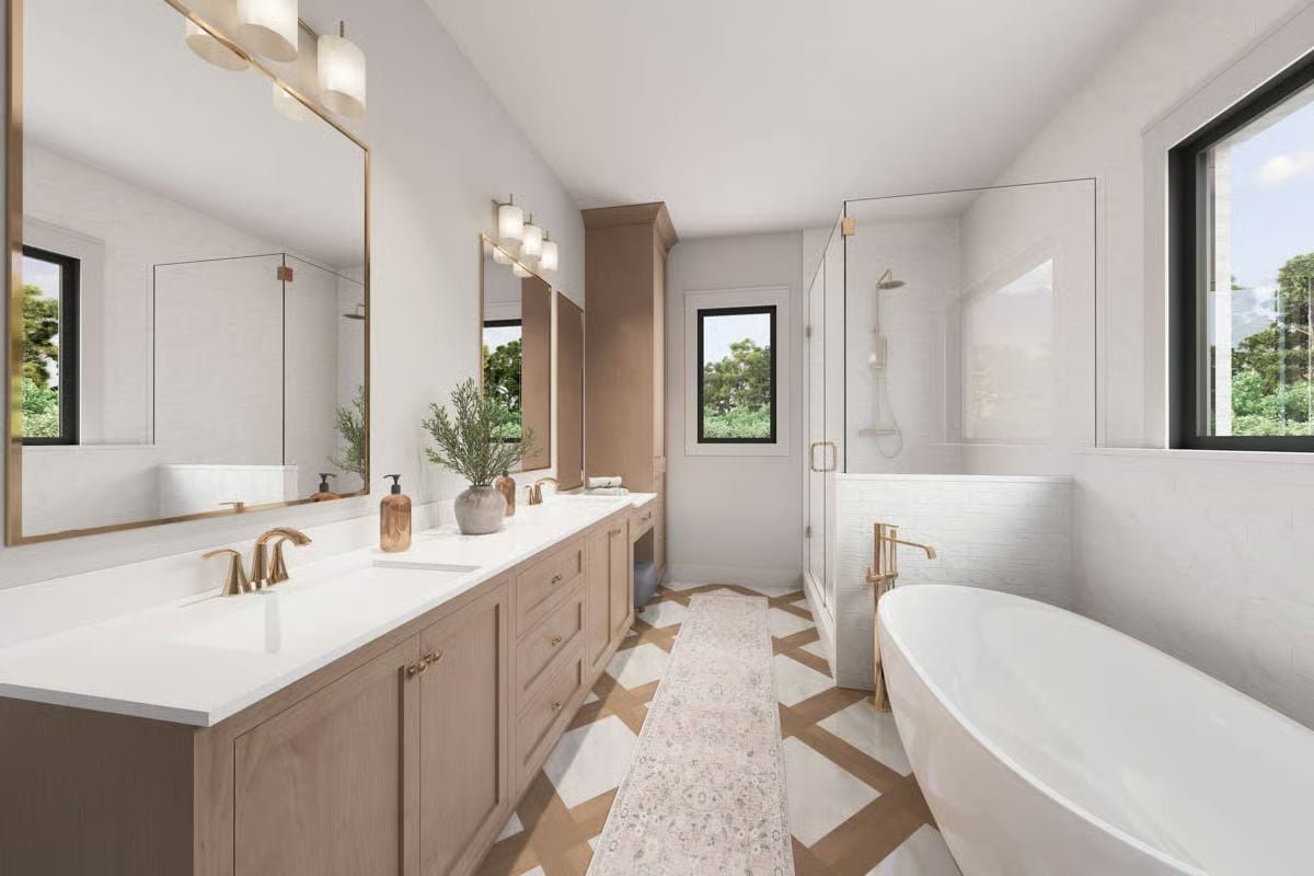 Gold Fixtures and Warm Cabinetry Give This Primary Bath a Grounded Elegance