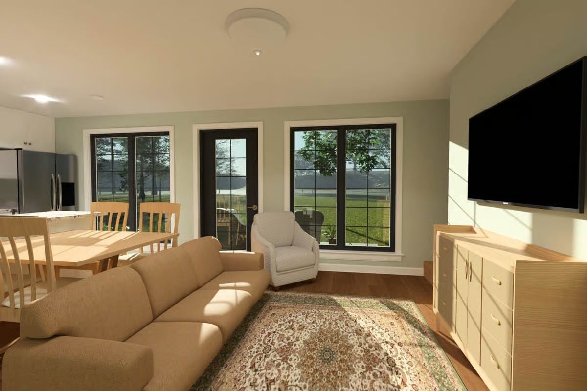 Living Area with Black-Framed French Doors and Natural Light
