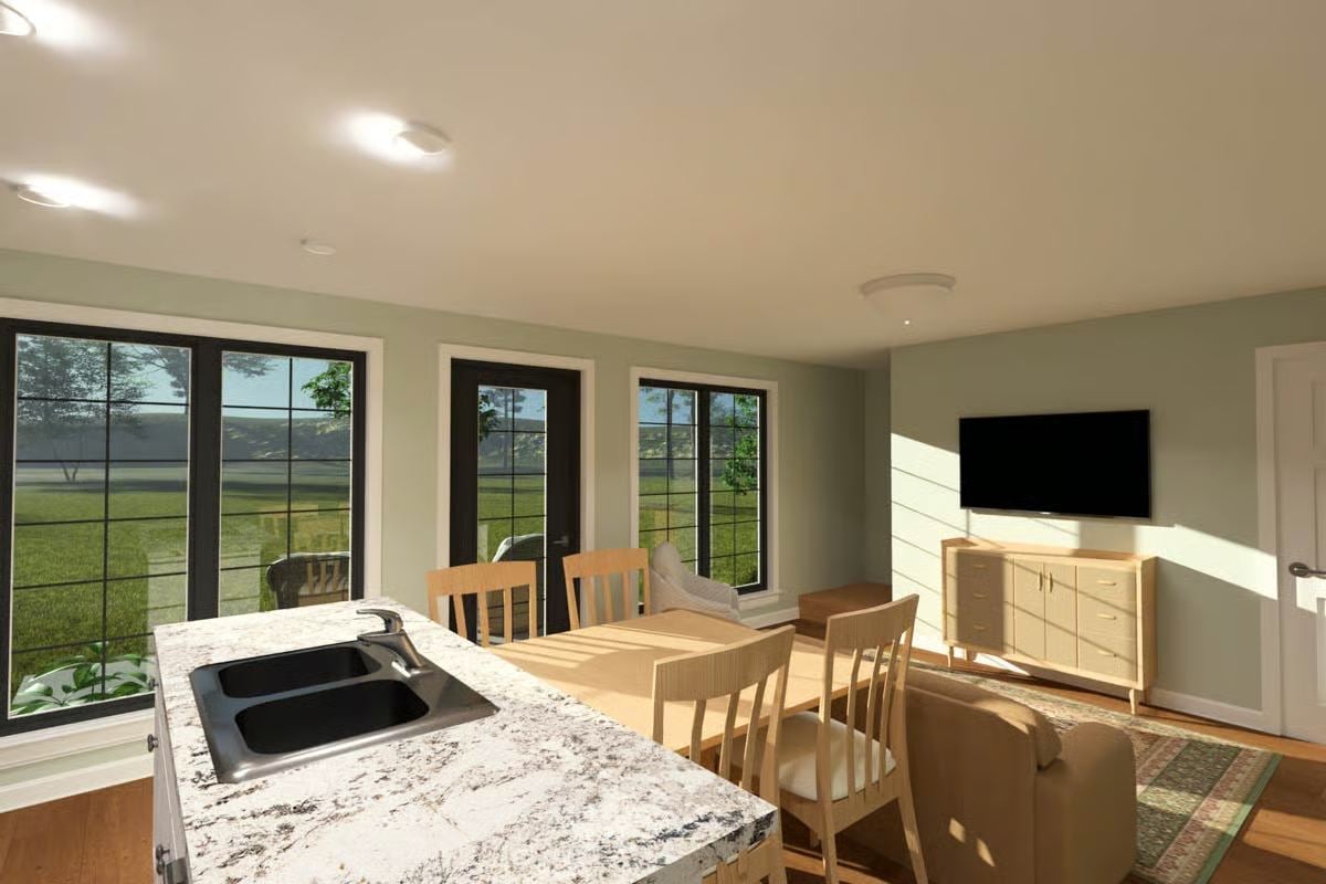 Kitchen and Dining Area with Light Wood Furniture and Granite Counter
