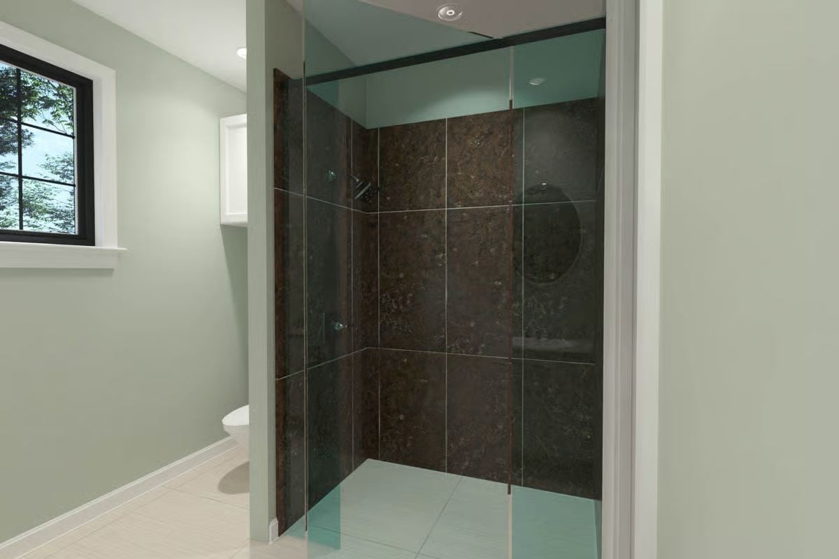 Glass-Enclosed Shower with Dark Tile and Minimalist Hardware