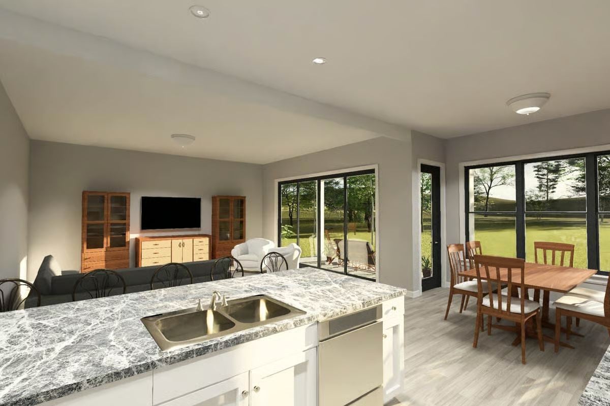 Open-Concept Kitchen, Dining, and Living Space with Marble Island